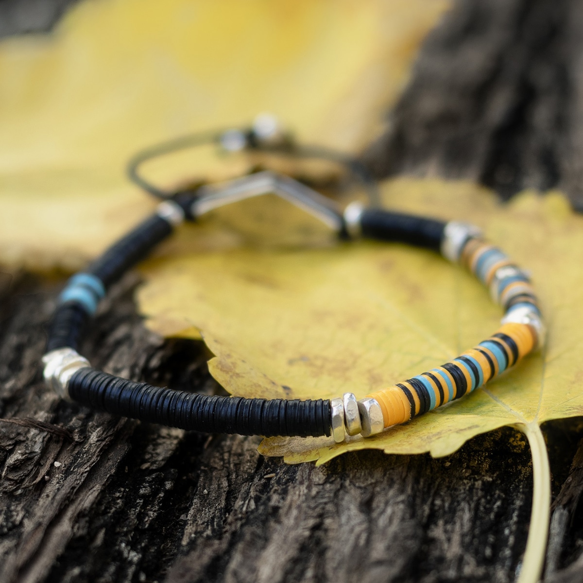 Winterfall, african jewelry, disc jewelry, winterfall colors, orange bracelet, men disc jewel, disk jewelry, women disc jewel, light blue bracelet, nature bracelet, designer jewelry, africa bracelet, wood colors jewel