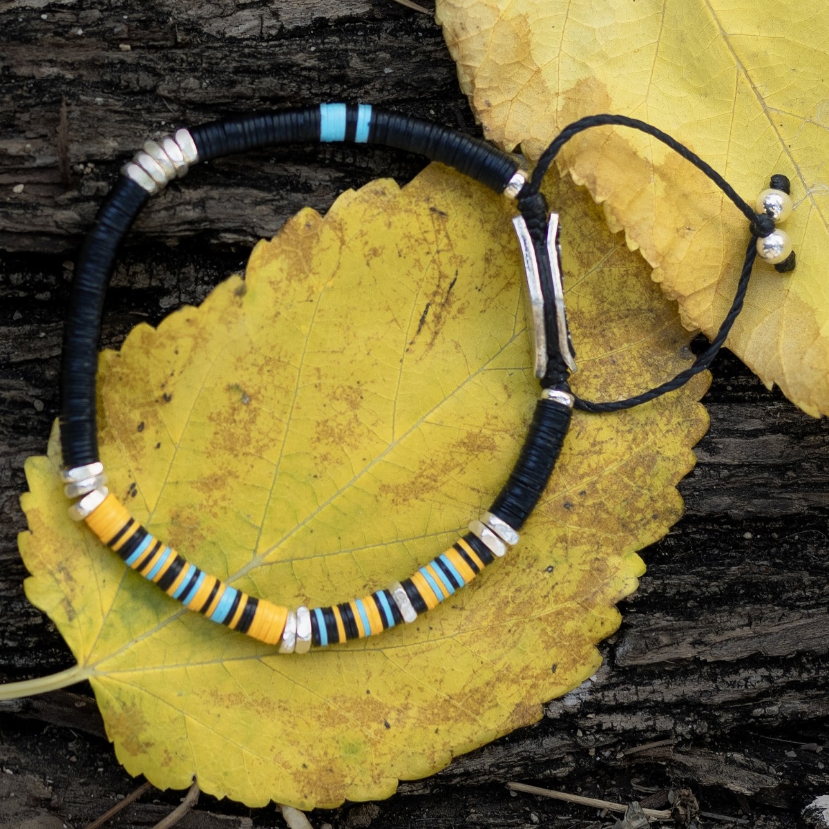 Winterfall, african jewelry, disc jewelry, winterfall colors, orange bracelet, men disc jewel, disk jewelry, women disc jewel, light blue bracelet, nature bracelet, designer jewelry, africa bracelet, wood colors jewel